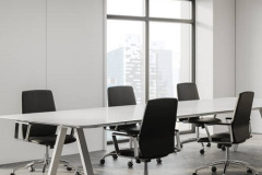 Corner of modern meeting room with white and concrete walls, long white conference table with black armchairs, horizontal mock up poster frame and window with blurry cityscape. 3d rendering